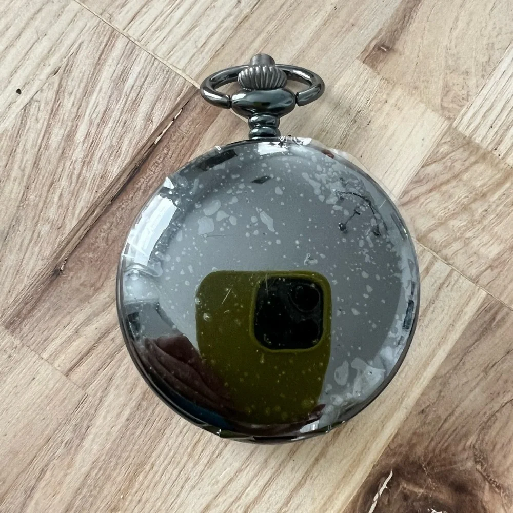 Black mechanical double sided Skelton peephole pocket watch working